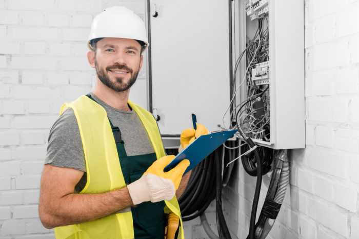 Self employed electrician at work